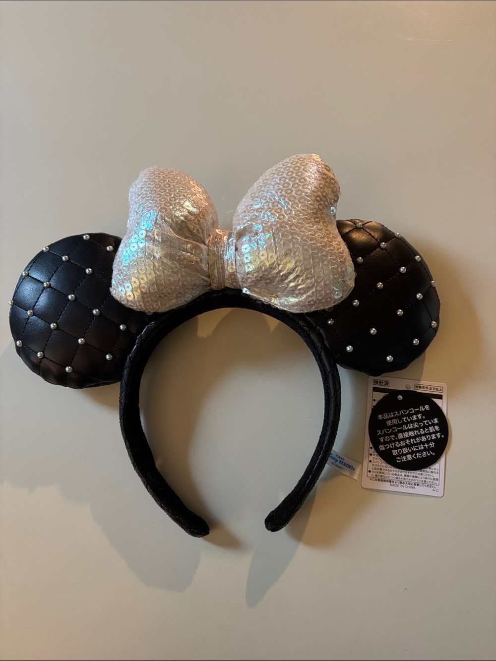 Tokyo Disney Black Quilted Minnie Ears Headband with Iridescent Sequin Bow